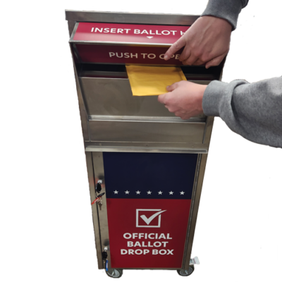 Inserting a ballot envelope into a ballot drop box